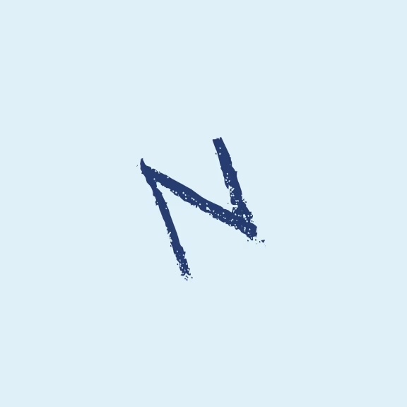 The image displays a stylized letter  N  with a blue background and a speckled texture resembling paint splatters.